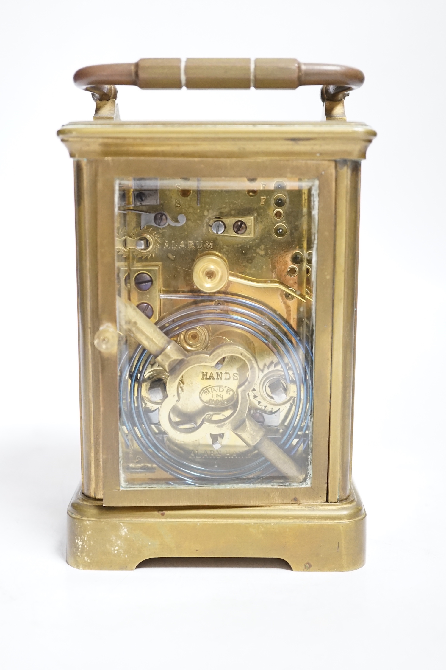 A late 19th century French brass cased eight day carriage clock with incorporated alarm mechanism, retailed by Dent, 12cm high